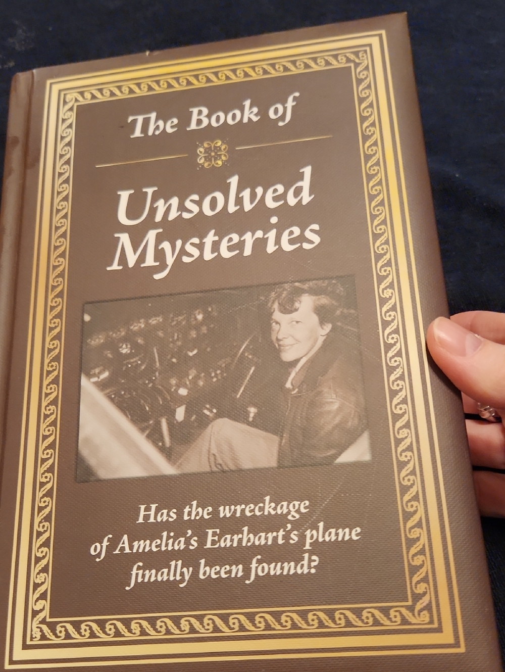 The Book of Unsolved Mysteries - Brown Hardcover